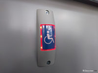 Przycisk dla osoby niepełnosprawnej na wózku